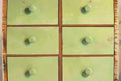 an oil painting on panel, 17.75 x 20.25 inches, painted in 2020. It is a painting of the front face of a chest of drawers.