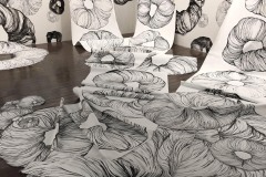 Large scale drawing installation at William Blizzard Gallery. Large muscle-tissue like donut forms challenge the scale of a room by completely filling the space, streaming down walls and covering the floor.