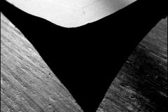 Black and white photograph of a book shadow