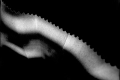 Black and white photograph of a paper bag detail
