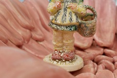 showing one girl figure in tongue basin.