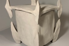 Square box, with triangular points at edges
