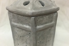 Jar with embossed and carved surface with the pattern of constellations on surface, and pierced lid.