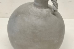 Sculpture in the shape of a cannonball bomb.