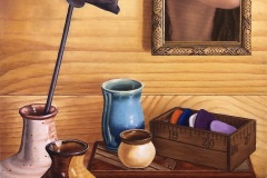 A warm toned colorful still life with several handmade pots in the foreground. The background is wood-grain where a small mirror is mounted reflecting part of a woman's face.