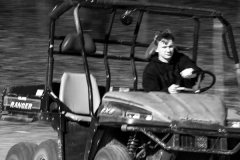 Speed, a young man driving a 4 wheeler.