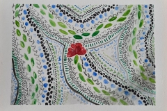 Colorful patterns with red flower slightly off-center.