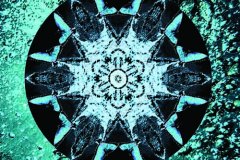 A blue, snowflake-like mandala.
