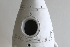 Jar in the shape of the rocket ship.
