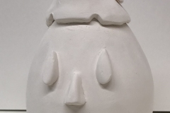 jar form in the shape of a smiling face with a hat.