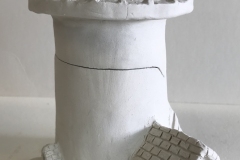 jar in the shape of a lighthouse.
