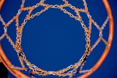 close up image of a basketball hoop from below.