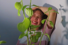 self portrait with plants.