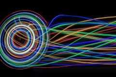 rainbow colored disc apprears as if in motion.