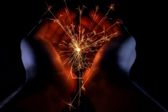 sparkles in hands.