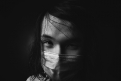 close up of face wearing a mask.