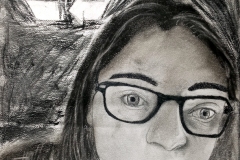 portrait of a woman's face with a recycling symbol in the background.