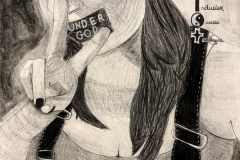 self portrait of a woman with a peace sign and the word "coexist" as an acronym.