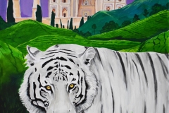 The white Bengal Tiger strolls in the forefront, as the farms of India are displayed in the background, and just beyond that the Taj Mahal rests in all its glory. The sky is painted with a beautiful purple tone which plays well off the colors of the beige Taj Mahal, the green of the landscape, and the white of the tiger.