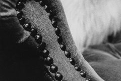 black and white close up of arm chair.